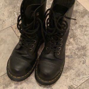 Dr Marten black combat is its steel toe look
